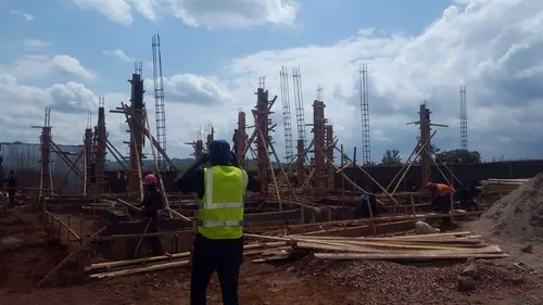 Équipe de PACOR Constructions au travail sur le chantier